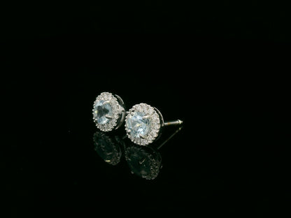 18K white gold aquamarine and diamond halo stud earrings, 0.48ct aquamarine and 0.13ct diamonds – Emirates Diamonds