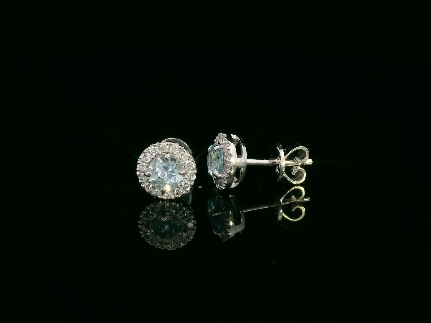 18K white gold aquamarine and diamond halo stud earrings, 0.48ct aquamarine and 0.13ct diamonds – Emirates Diamonds