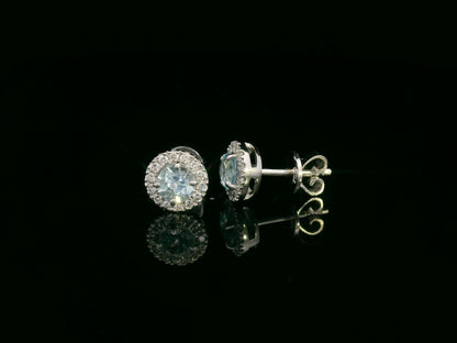 18K white gold aquamarine and diamond halo stud earrings, 0.48ct aquamarine and 0.13ct diamonds – Emirates Diamonds
