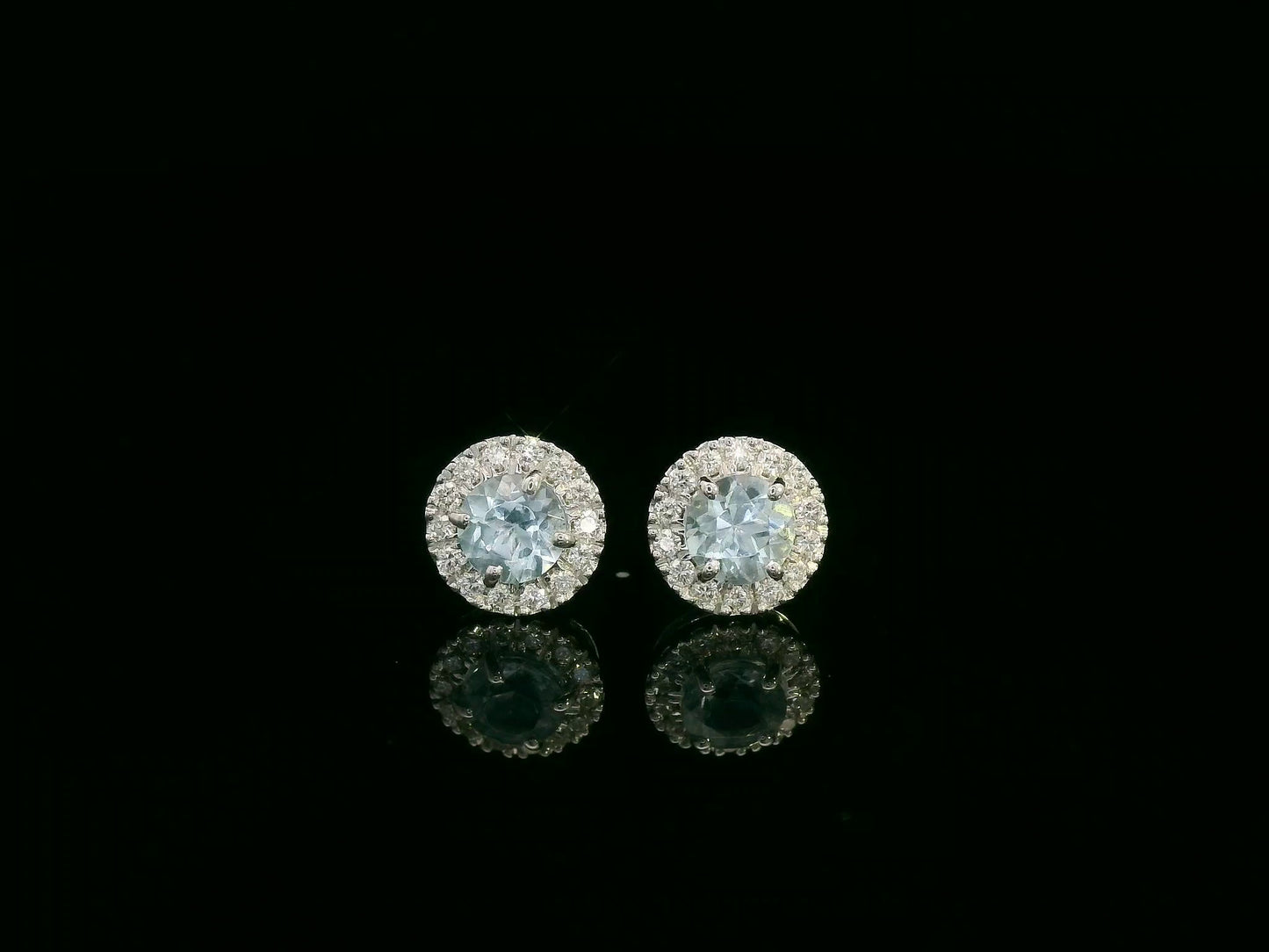 18K white gold aquamarine and diamond halo stud earrings, 0.48ct aquamarine and 0.13ct diamonds – Emirates Diamonds