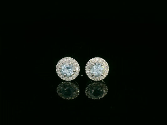 18K white gold aquamarine and diamond halo stud earrings, 0.48ct aquamarine and 0.13ct diamonds – Emirates Diamonds