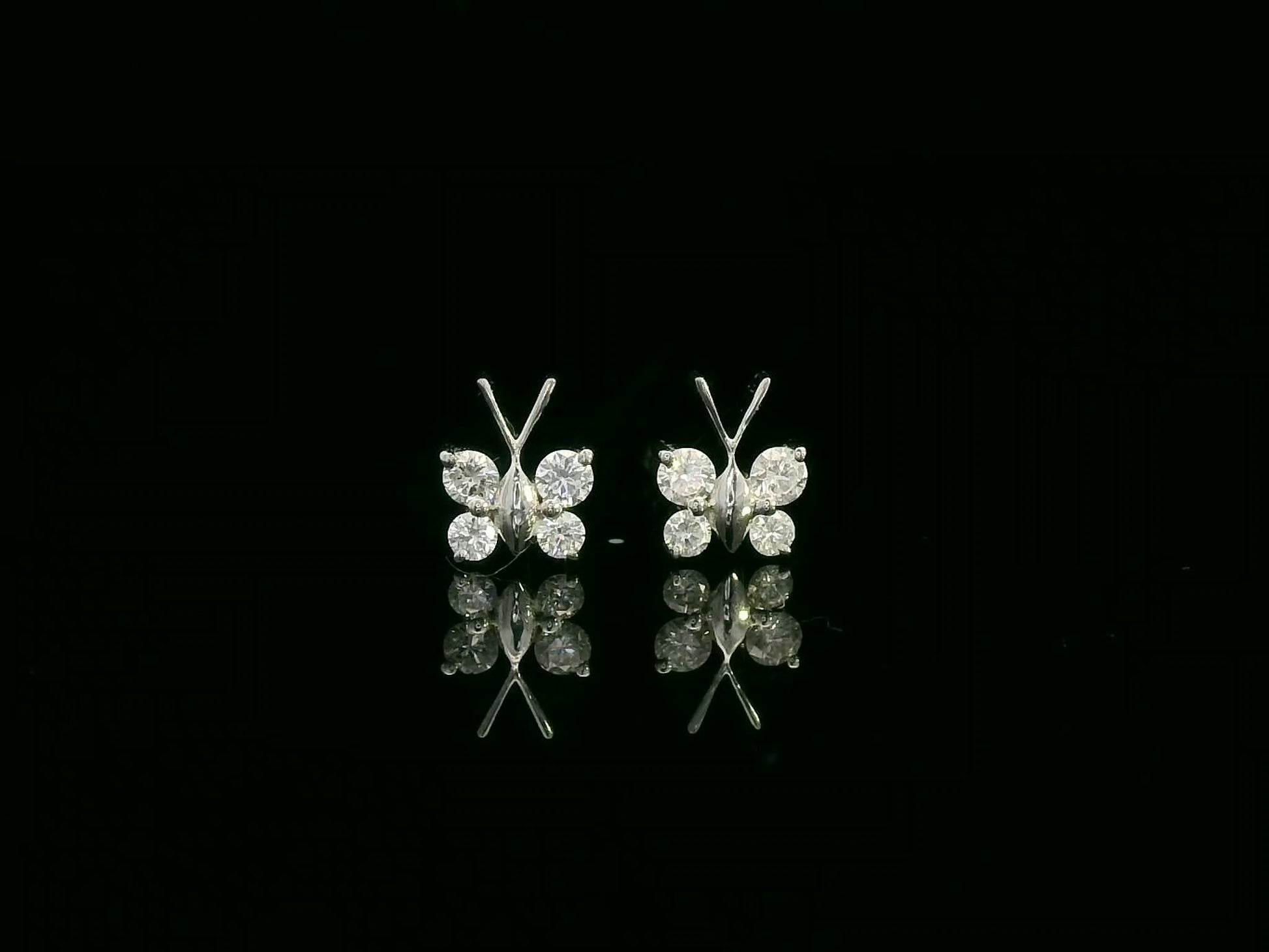 18K white gold diamond butterfly stud earrings – delicate small butterfly earrings by Emirates Diamonds