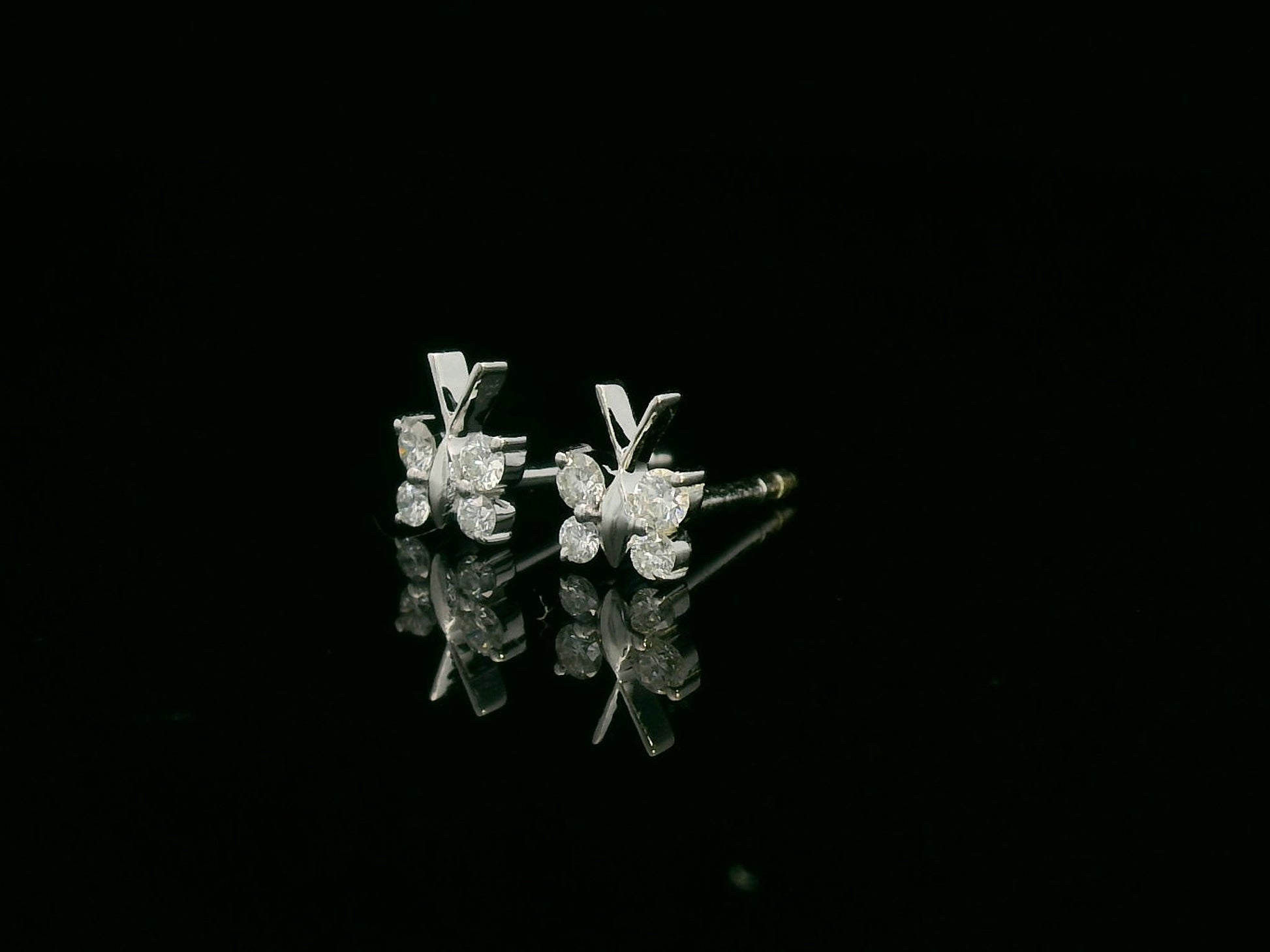 18K white gold diamond butterfly stud earrings – delicate small butterfly earrings by Emirates Diamonds