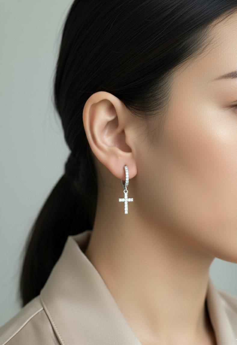 18K gold diamond cross drop hoop earrings with pavé-set natural diamonds by Emirates Diamonds.