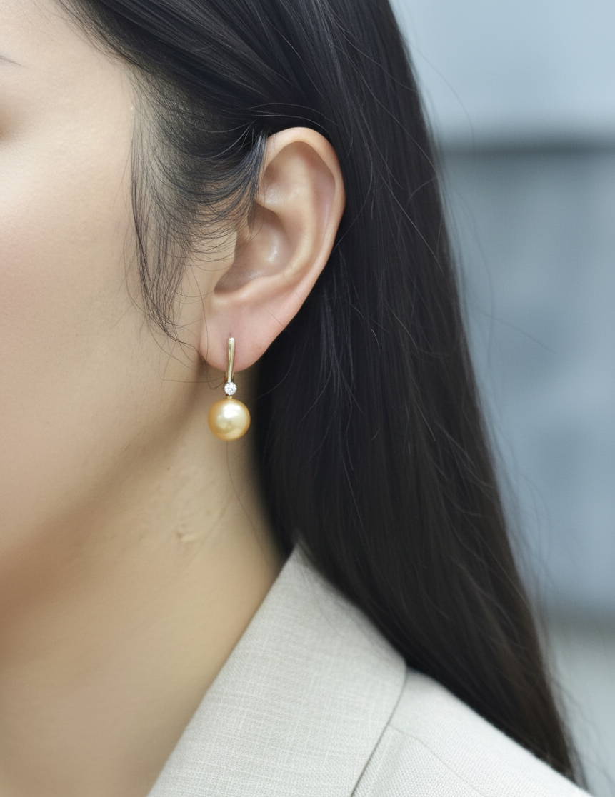 18K yellow gold South Sea golden pearl drop earrings with diamond accents by Emirates Diamonds