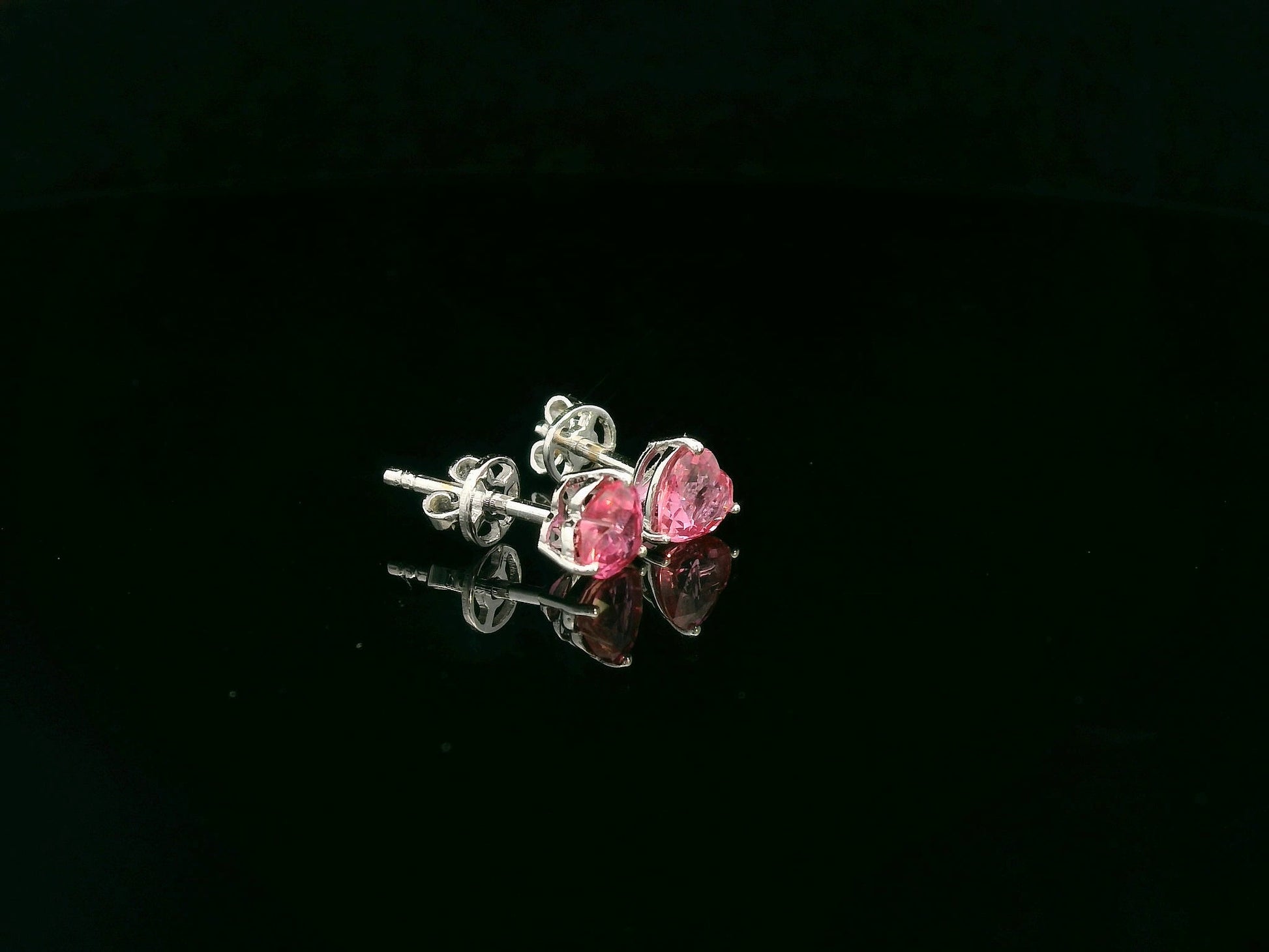 18K white gold heart-shaped ruby stud earrings – romantic fine jewelry by Emirates Diamonds