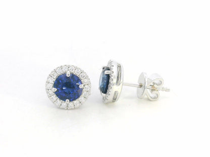 18K white gold blue sapphire and diamond halo stud earrings with round sapphires, 1.40 carat sapphires and 0.20 carat diamonds by Emirates Diamonds
