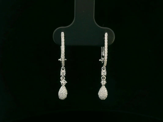 18K white gold diamond drop earrings with pavé-set hoop design and dangling teardrop diamonds by Emirates Diamonds