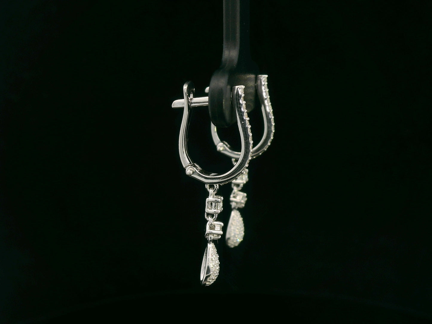 18K white gold diamond drop earrings with pavé-set hoop design and dangling teardrop diamonds by Emirates Diamonds