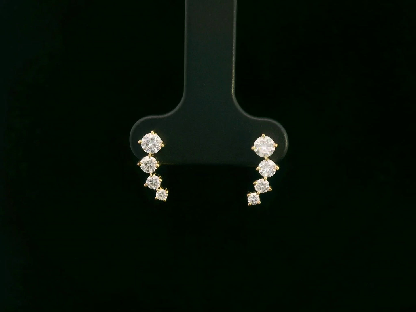 Diamond stud earrings in 18K yellow gold with 0.53 carat total diamond weight by Emirates Diamonds