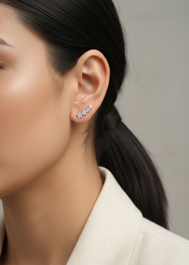 Diamond floral stud earrings in 18K white gold with 0.54 carat total diamond weight by Emirates Diamonds