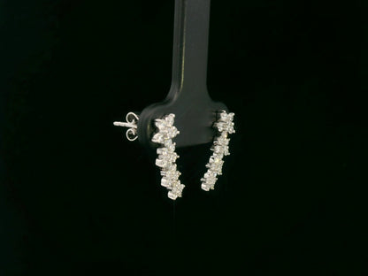 Diamond floral stud earrings in 18K white gold with 0.54 carat total diamond weight by Emirates Diamonds