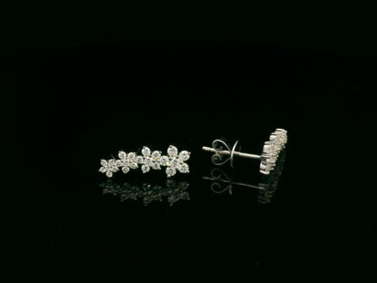 Diamond floral stud earrings in 18K white gold with 0.54 carat total diamond weight by Emirates Diamonds