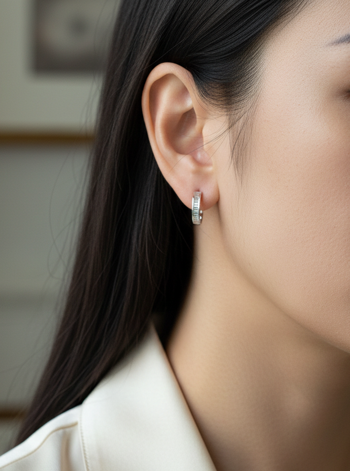 Baguette diamond hoop earrings in 18K white gold with 0.42 carat total diamond weight by Emirates Diamonds