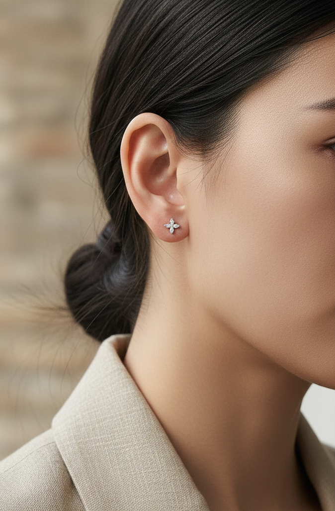 Diamond floral stud earrings in 18K white gold with marquise-cut diamonds totaling 0.34 carat by Emirates Diamonds