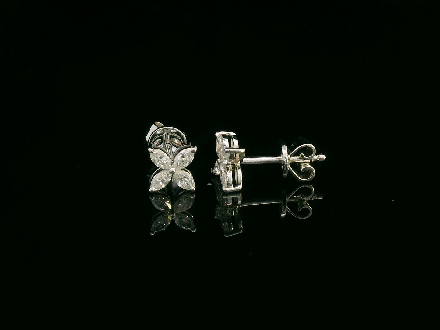 Diamond floral stud earrings in 18K white gold with marquise-cut diamonds totaling 0.34 carat by Emirates Diamonds