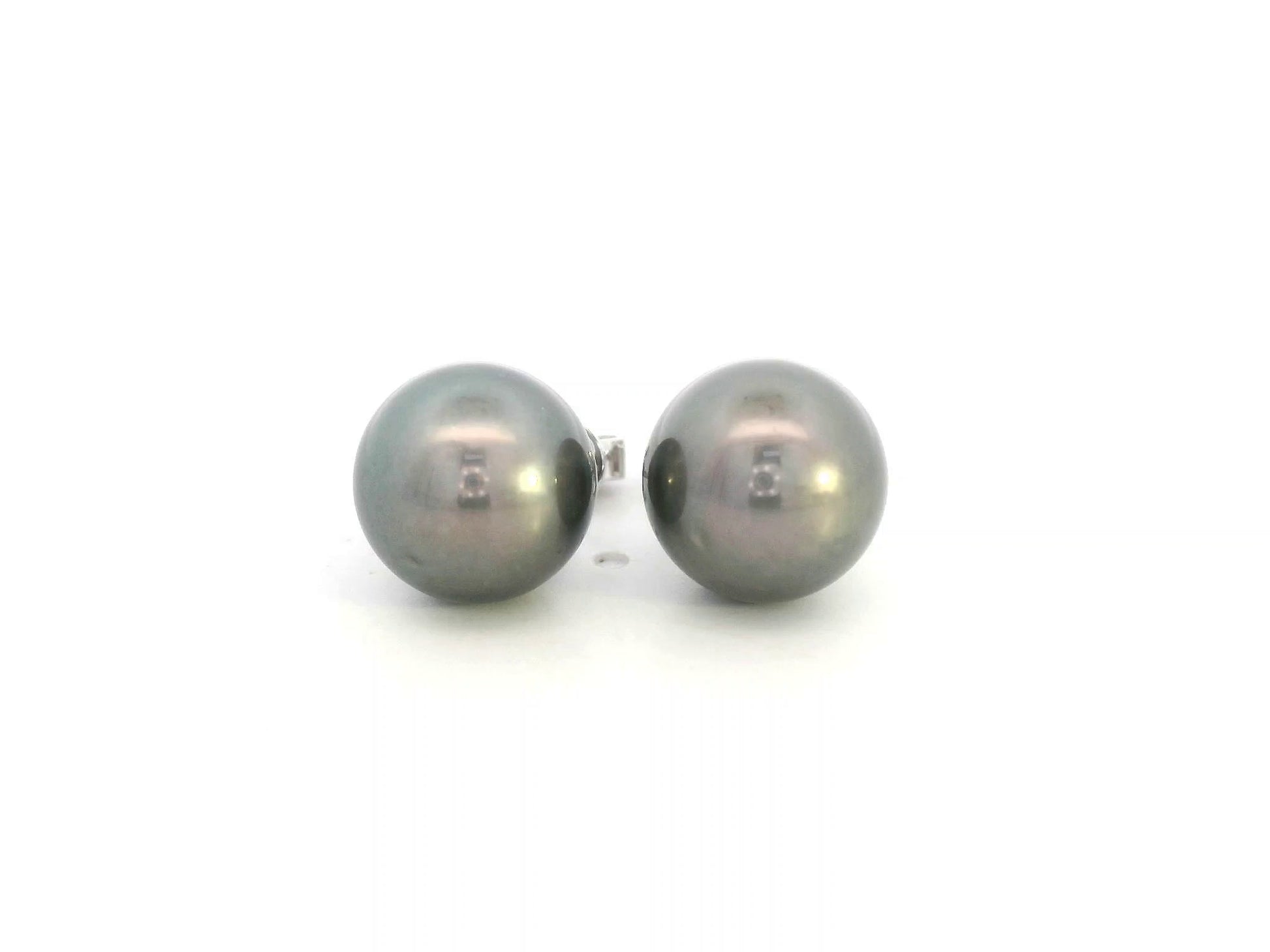 Tahitian black pearl stud earrings in 18K white gold featuring South Sea pearls by Emirates Diamonds