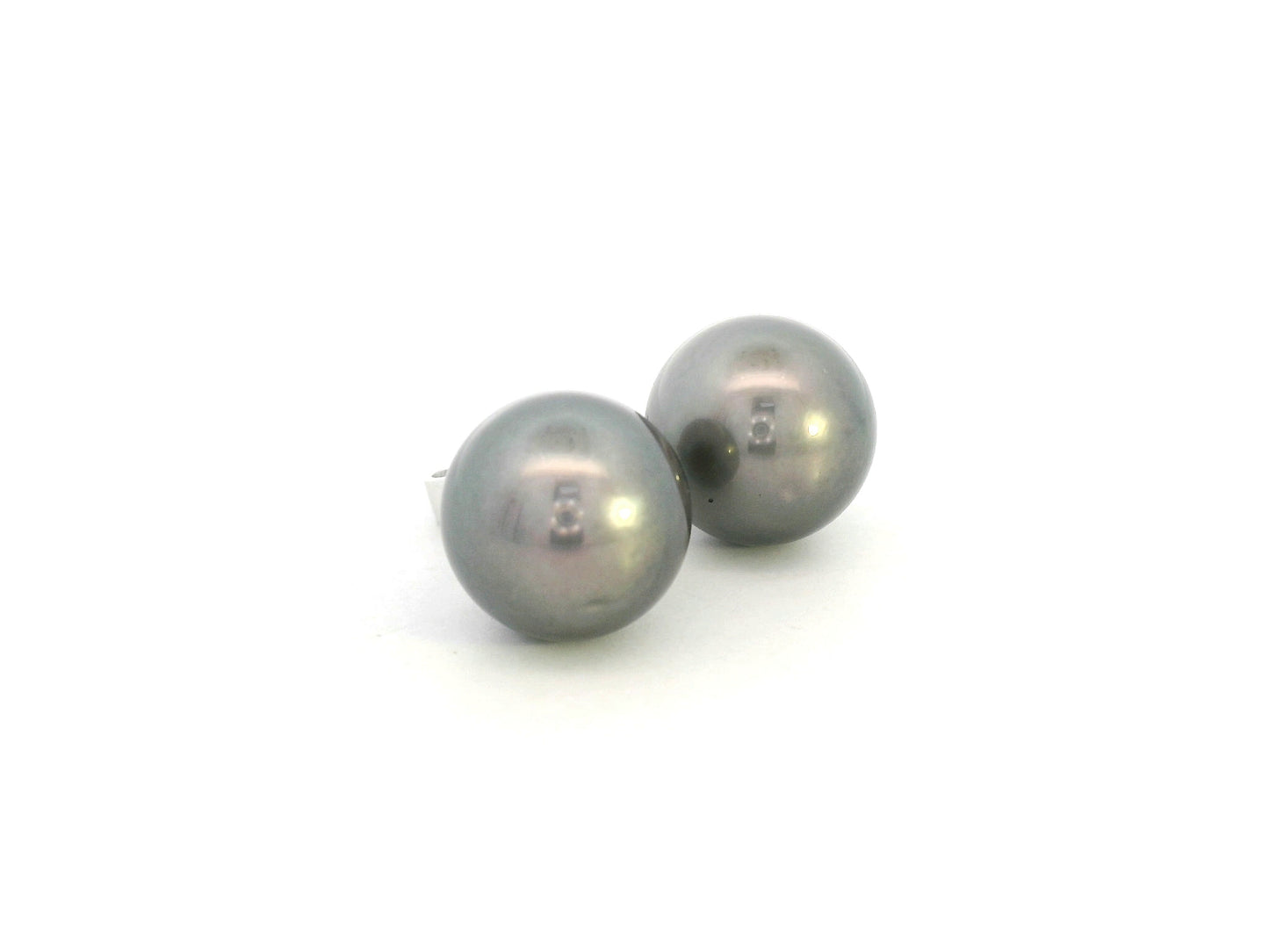Tahitian black pearl stud earrings in 18K white gold featuring South Sea pearls by Emirates Diamonds