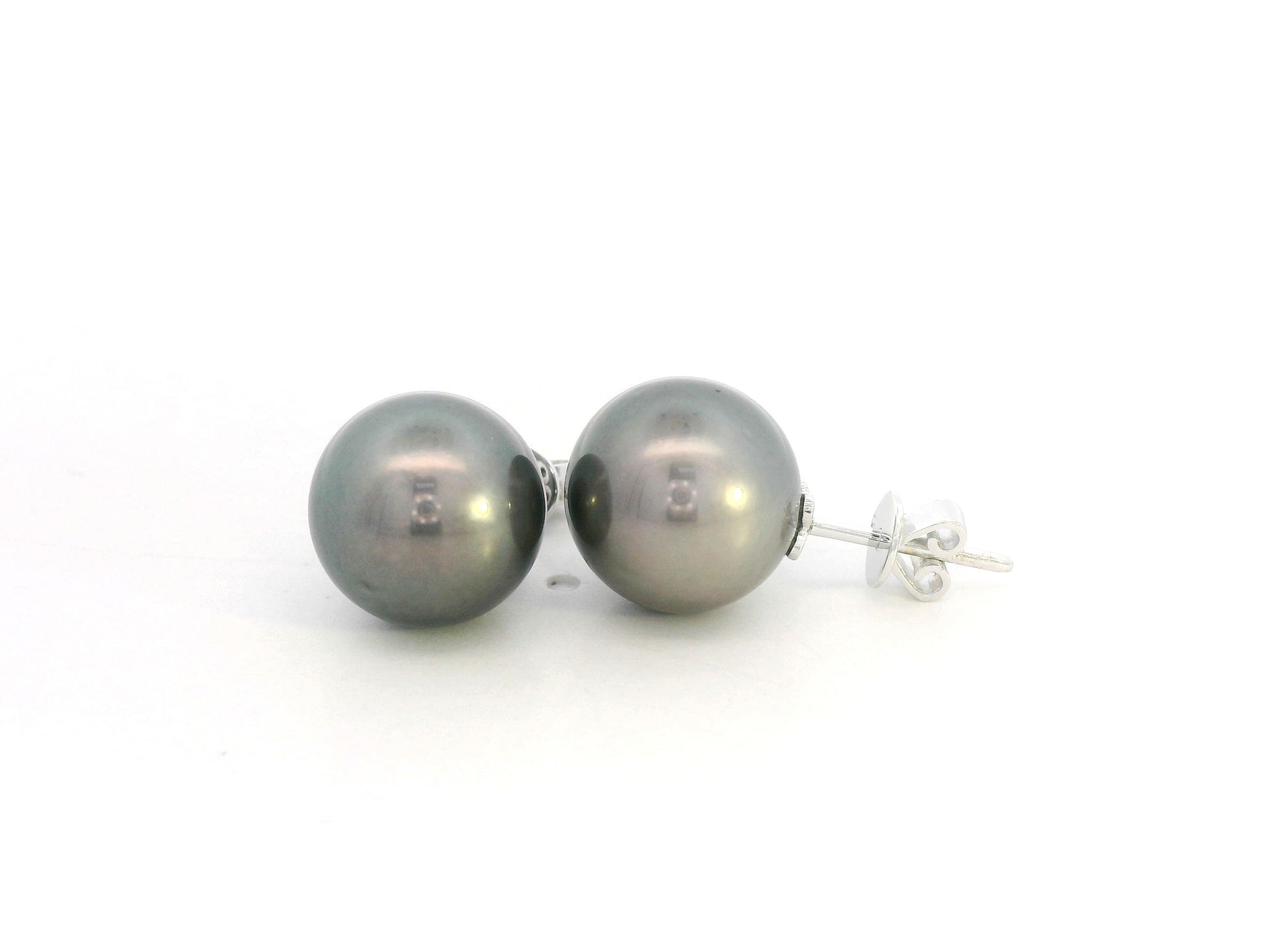 Tahitian black pearl stud earrings in 18K white gold featuring South Sea pearls by Emirates Diamonds