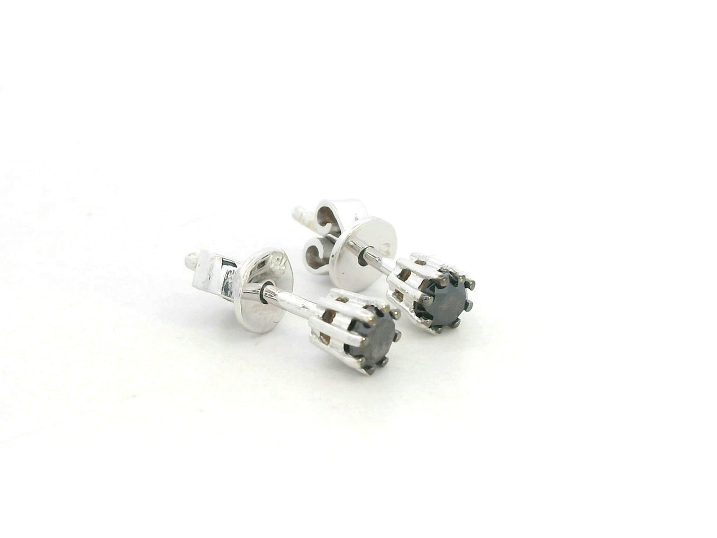 Black diamond stud earrings in 18K white gold with round-cut diamonds by Emirates Diamonds