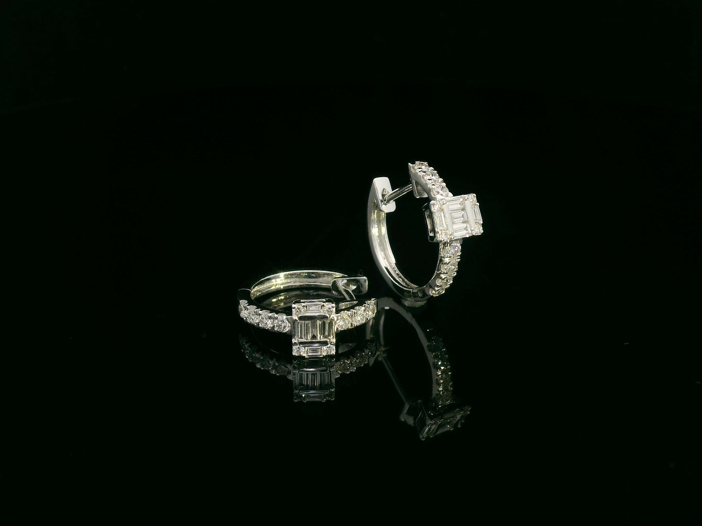 18K white gold diamond earrings with emerald-cut inspired baguette and round diamond centerpiece – fine jewelry by Emirates Diamonds