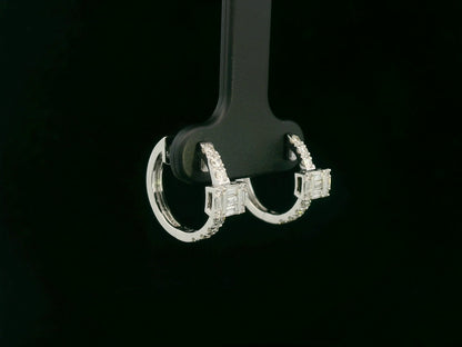 18K white gold diamond earrings with emerald-cut inspired baguette and round diamond centerpiece – fine jewelry by Emirates Diamonds