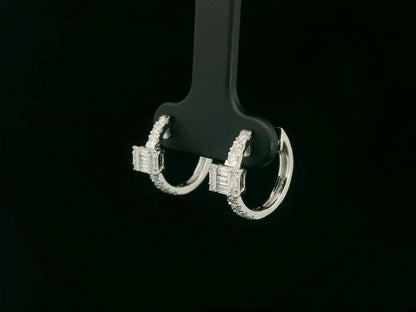 18K white gold diamond earrings with emerald-cut inspired baguette and round diamond centerpiece – fine jewelry by Emirates Diamonds