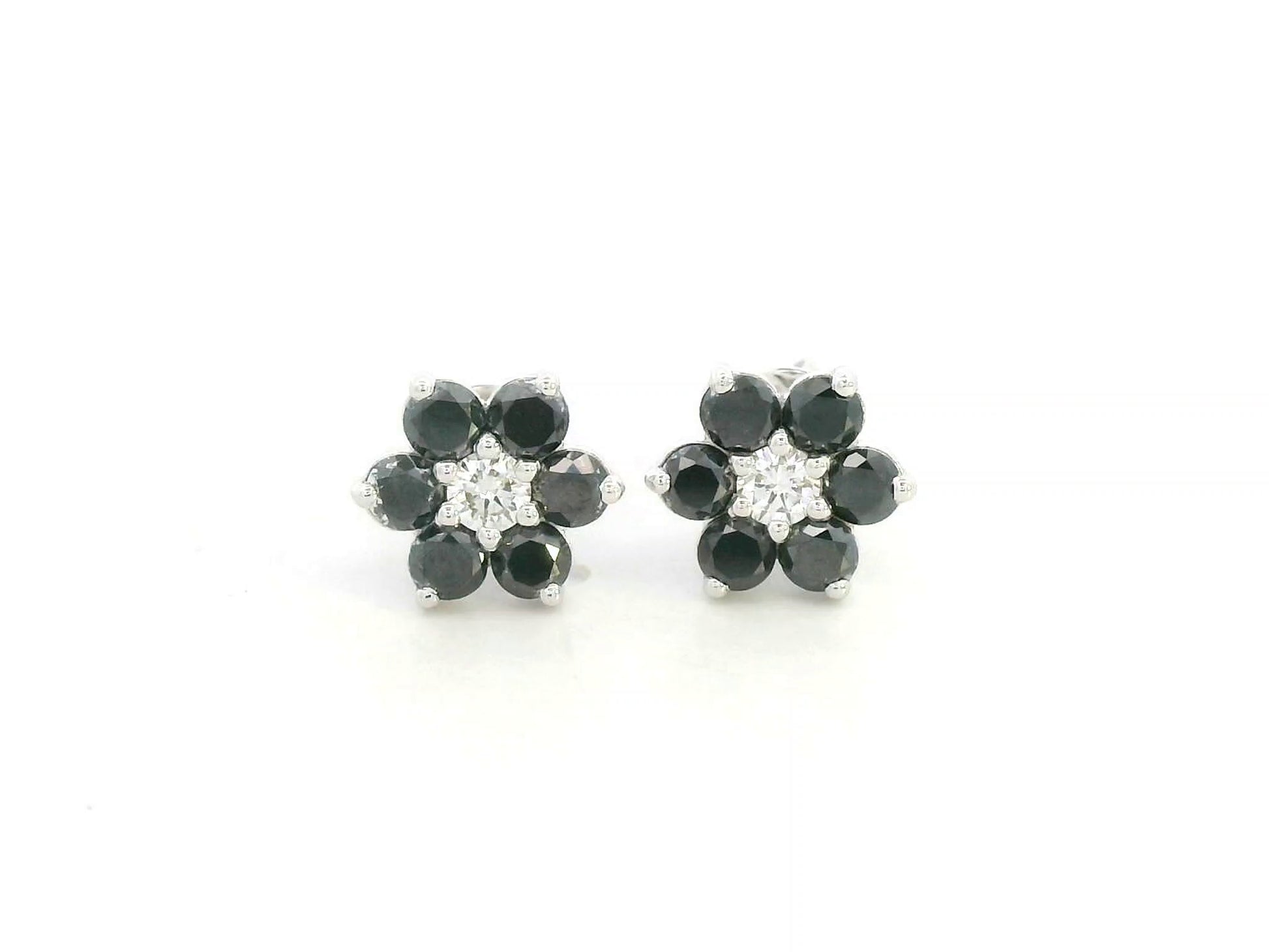 Black and white diamond floral stud earrings in 18K white gold with 1.27 carat total diamond weight by Emirates Diamonds