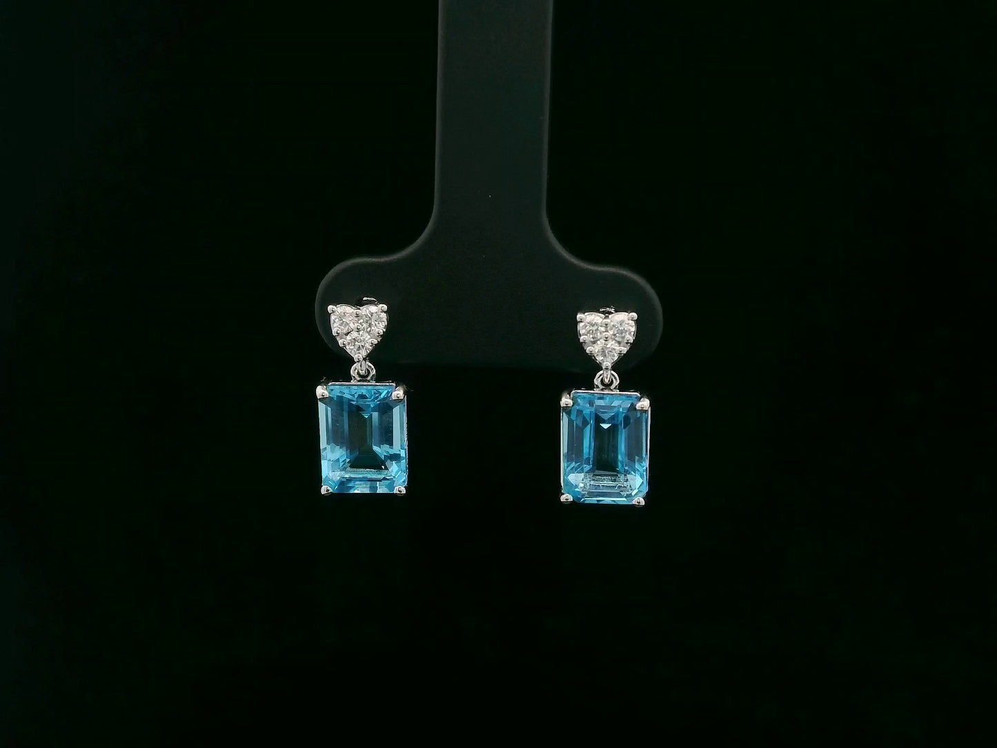 Swiss blue topaz and diamond stud earrings in 18K white gold by Emirates Diamonds.