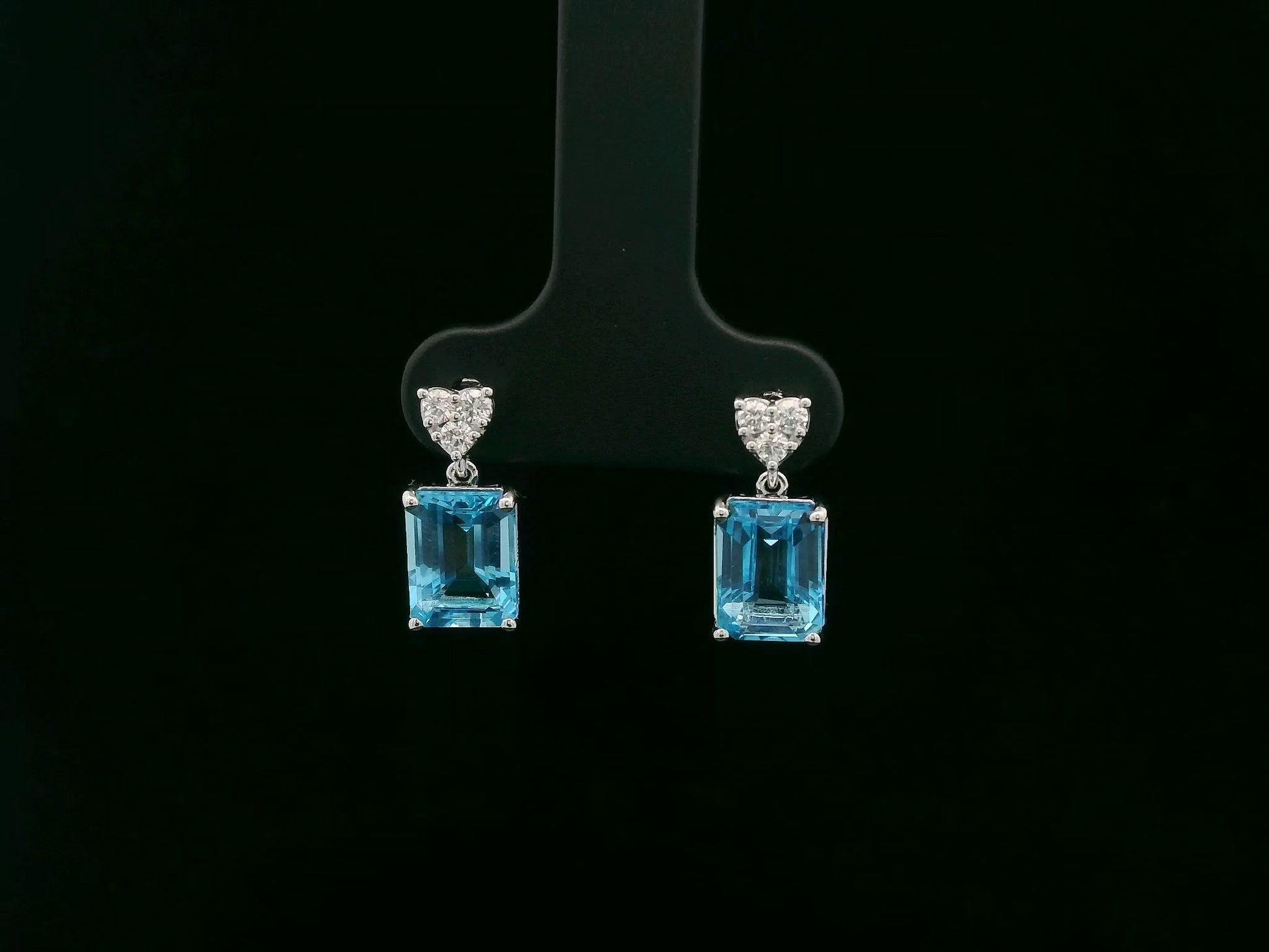 Swiss blue topaz and diamond stud earrings in 18K white gold by Emirates Diamonds.