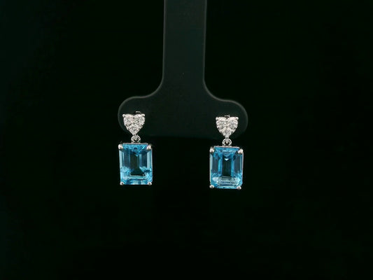 Swiss blue topaz and diamond stud earrings in 18K white gold by Emirates Diamonds.