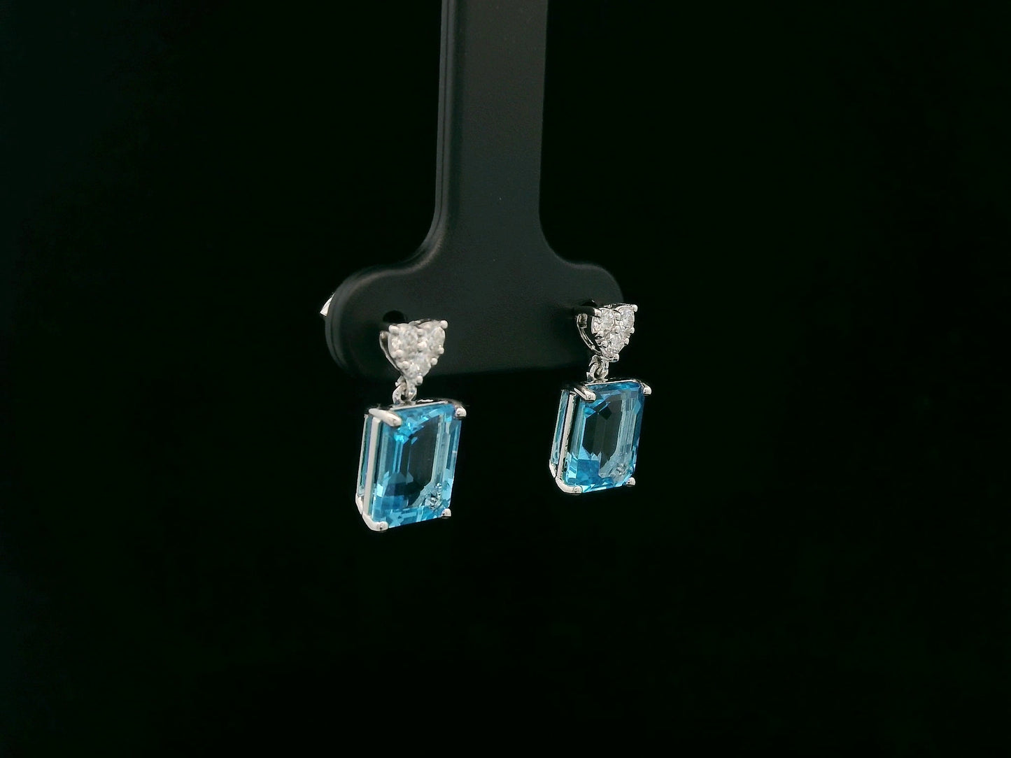 Swiss blue topaz and diamond stud earrings in 18K white gold by Emirates Diamonds.