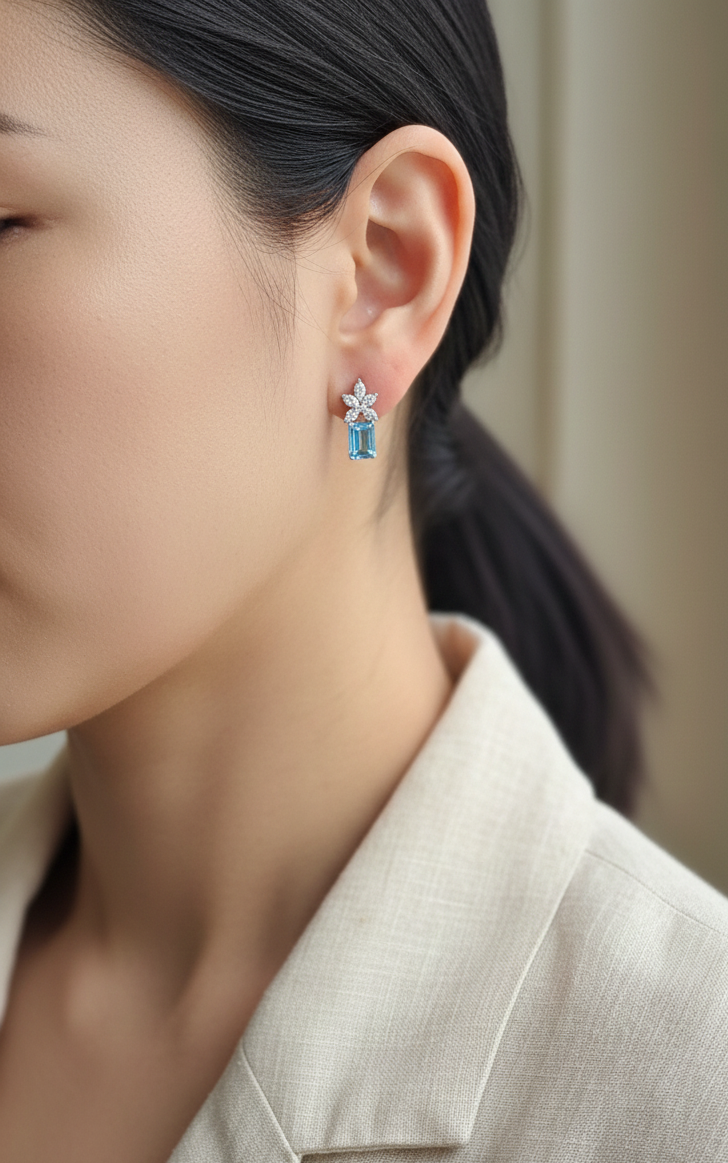 18K white gold Swiss blue topaz and diamond stud earrings with  diamond floral design – Emirates Diamonds