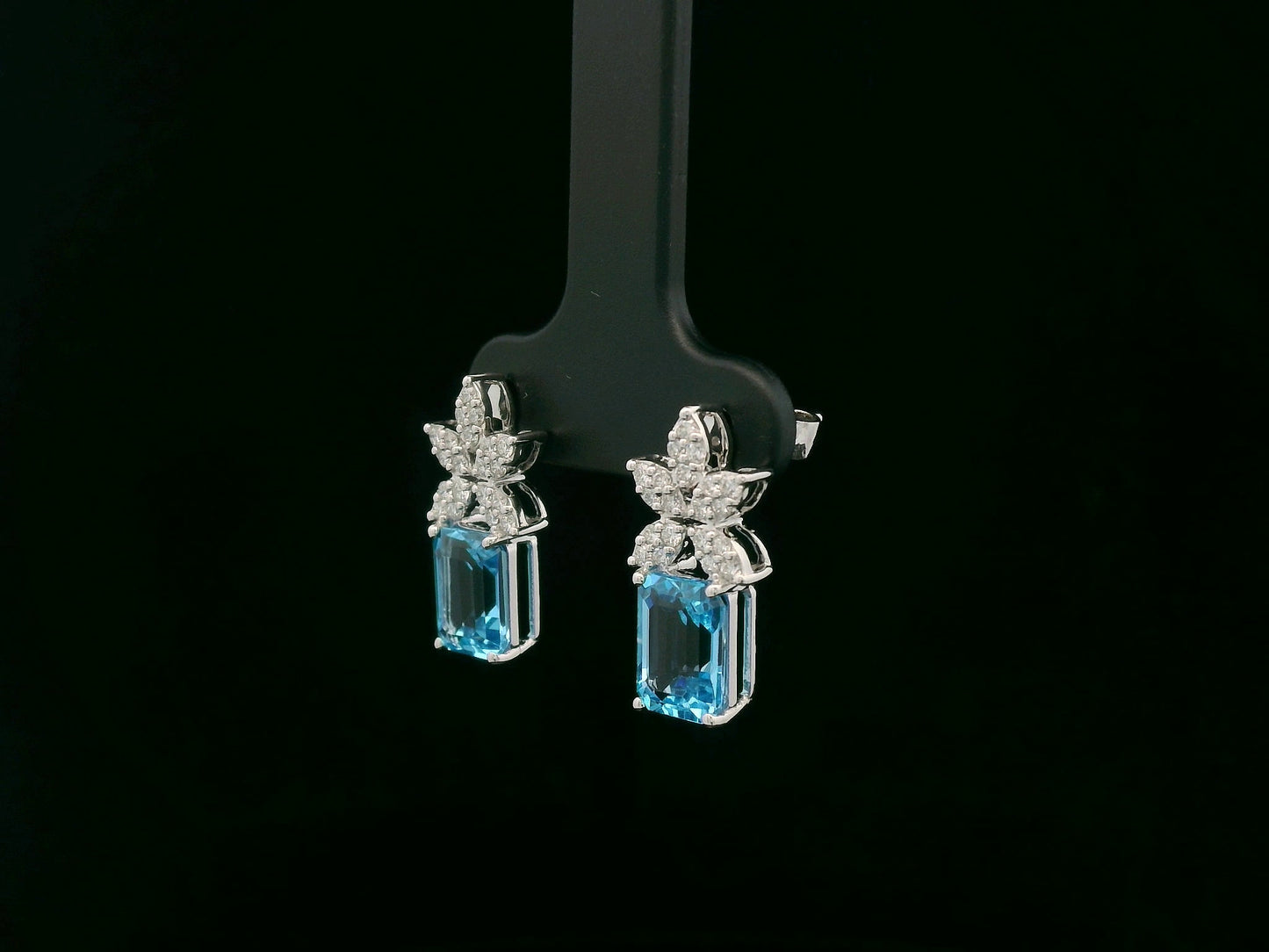 18K white gold Swiss blue topaz and diamond stud earrings with  diamond floral design – Emirates Diamonds