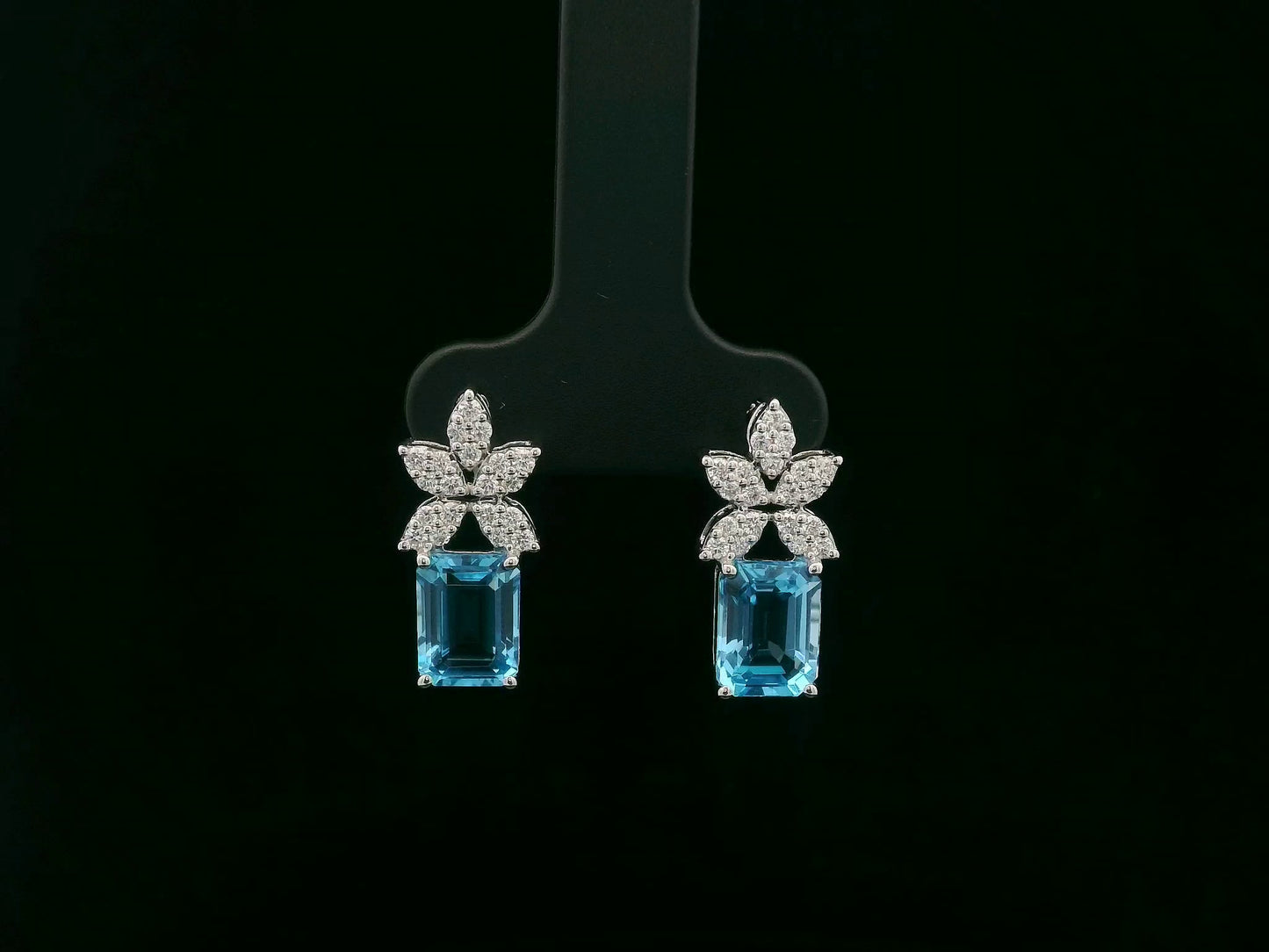 18K white gold Swiss blue topaz and diamond stud earrings with  diamond floral design – Emirates Diamonds