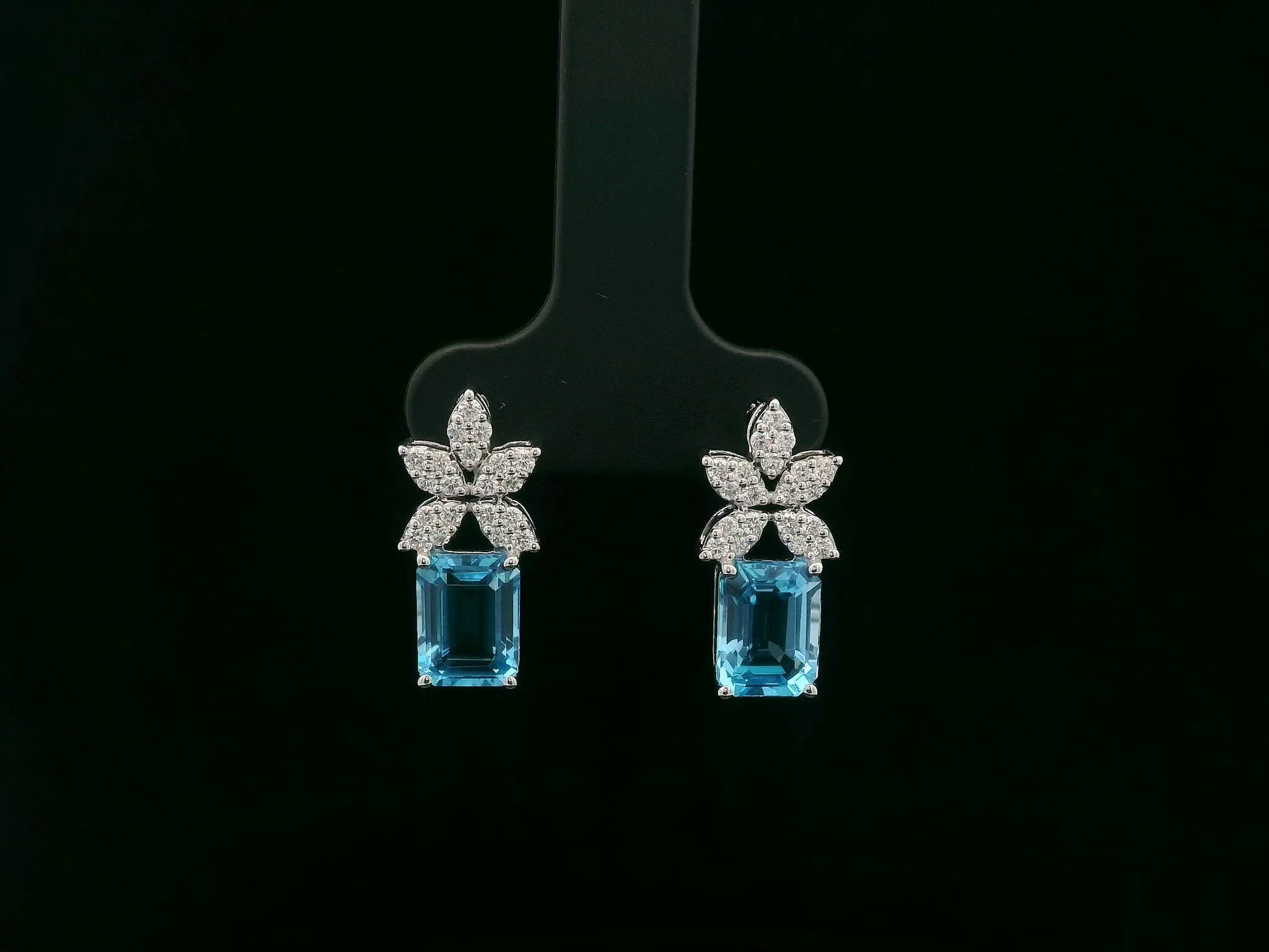 18K white gold Swiss blue topaz and diamond stud earrings with  diamond floral design – Emirates Diamonds