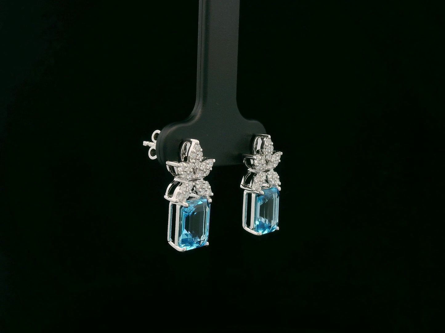 18K white gold Swiss blue topaz and diamond stud earrings with  diamond floral design – Emirates Diamonds