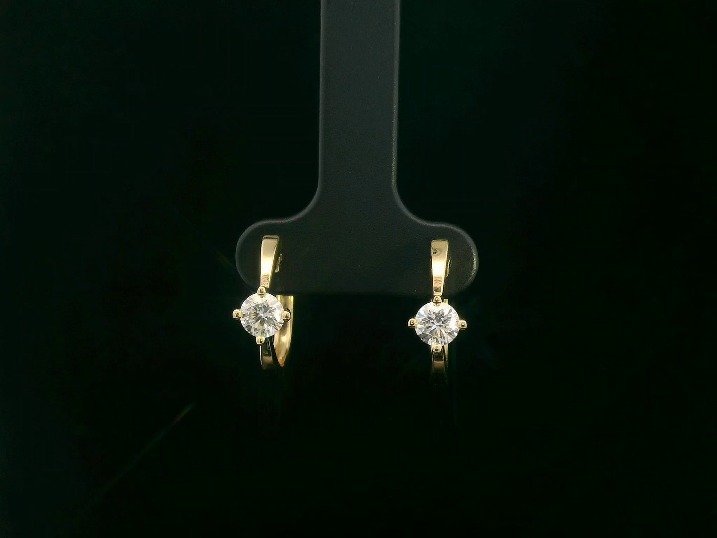 18K yellow gold diamond hoop earrings with round brilliant-cut diamonds, 0.63 carat total weight, fine jewelry by Emirates Diamonds.