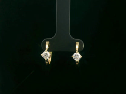 18K yellow gold diamond hoop earrings with round brilliant-cut diamonds, 0.63 carat total weight, fine jewelry by Emirates Diamonds.