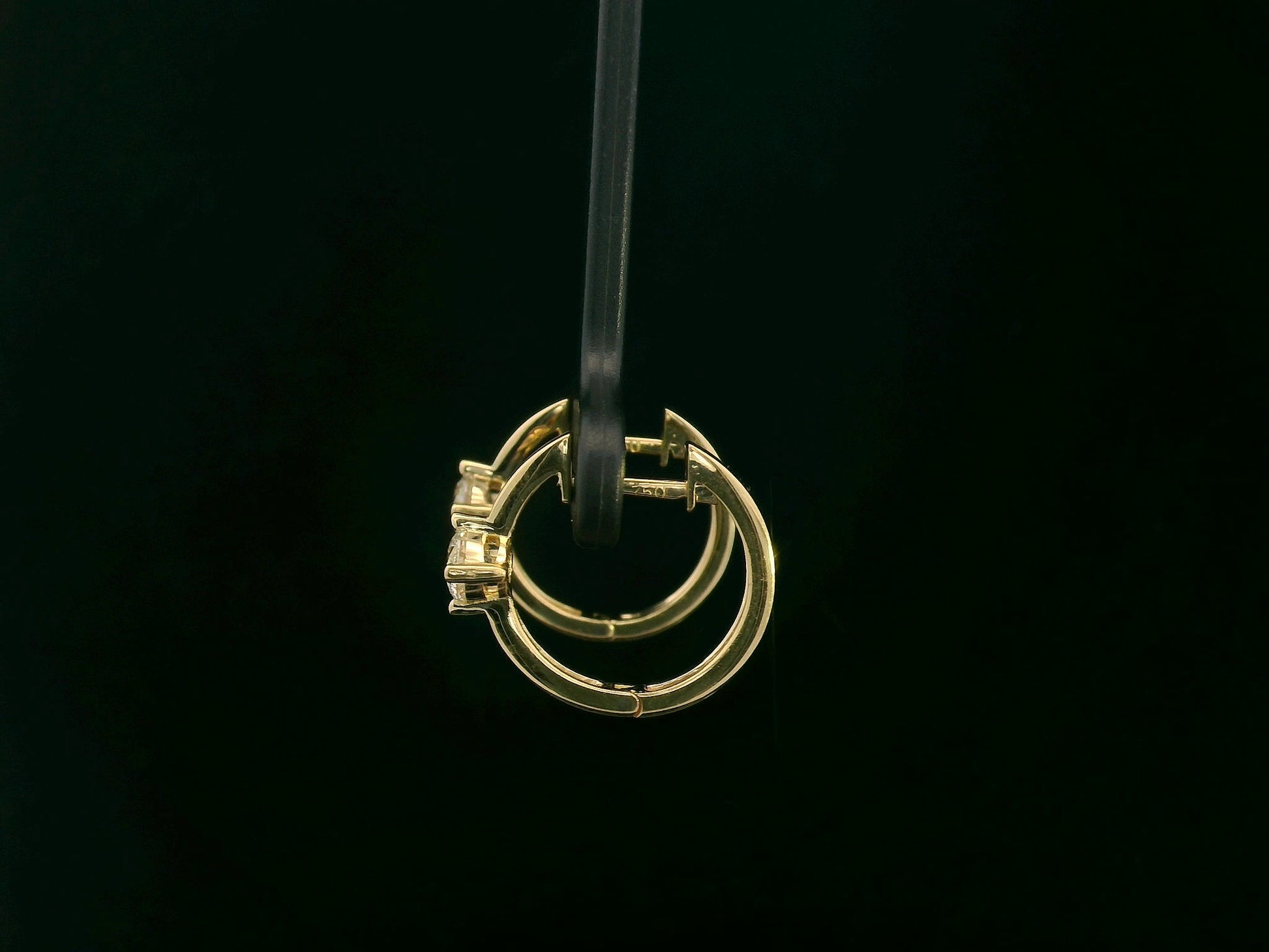 18K yellow gold diamond hoop earrings with round brilliant-cut diamonds, 0.63 carat total weight, fine jewelry by Emirates Diamonds.