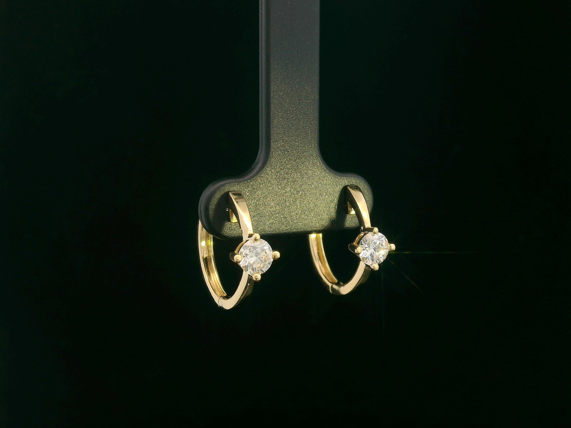 18K yellow gold diamond hoop earrings with round brilliant-cut diamonds, 0.63 carat total weight, fine jewelry by Emirates Diamonds.