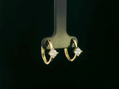 18K yellow gold diamond hoop earrings with round brilliant-cut diamonds, 0.63 carat total weight, fine jewelry by Emirates Diamonds.