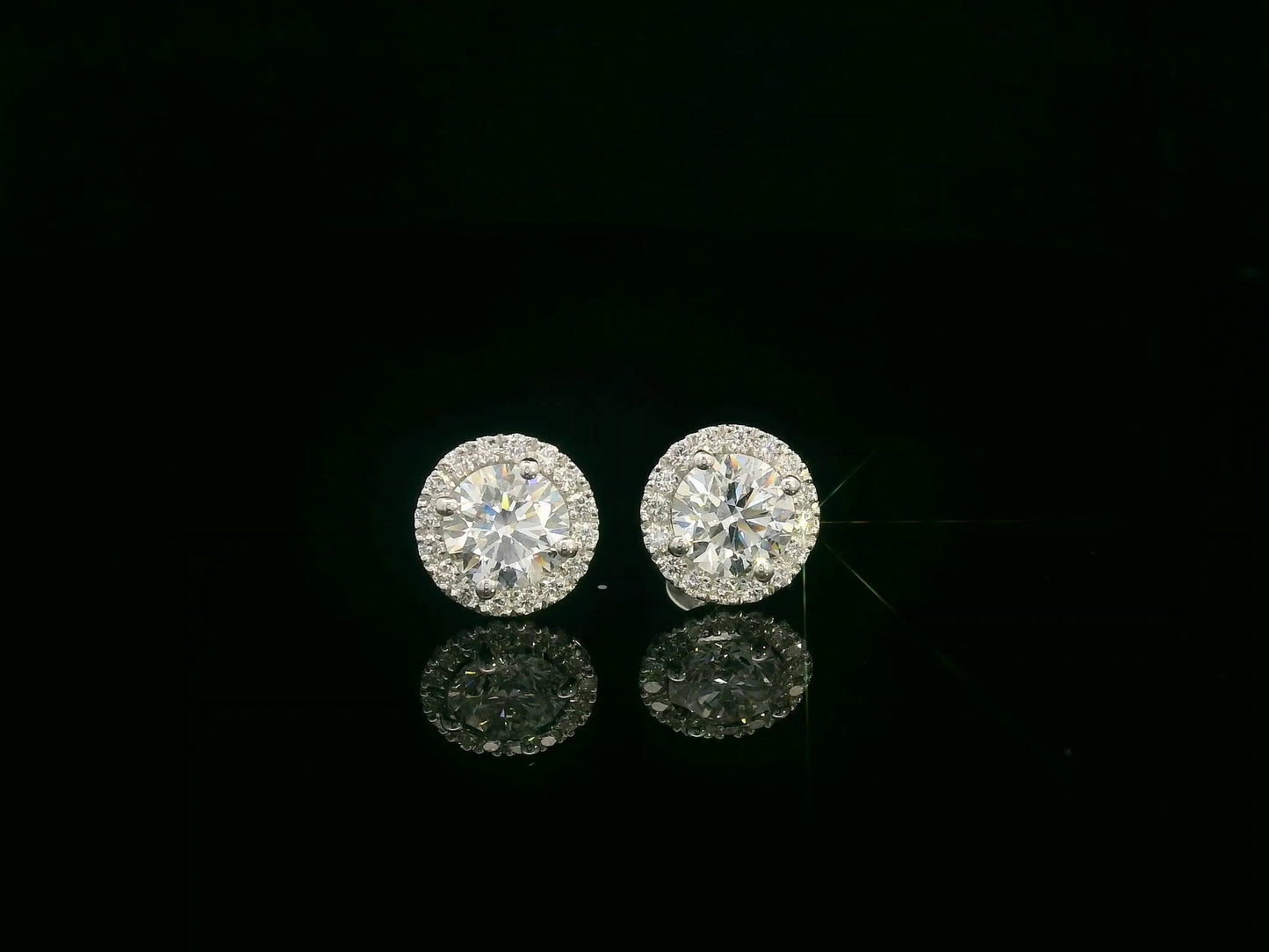 18K white gold round diamond halo stud earrings with GIA certified diamonds – Emirates Diamonds