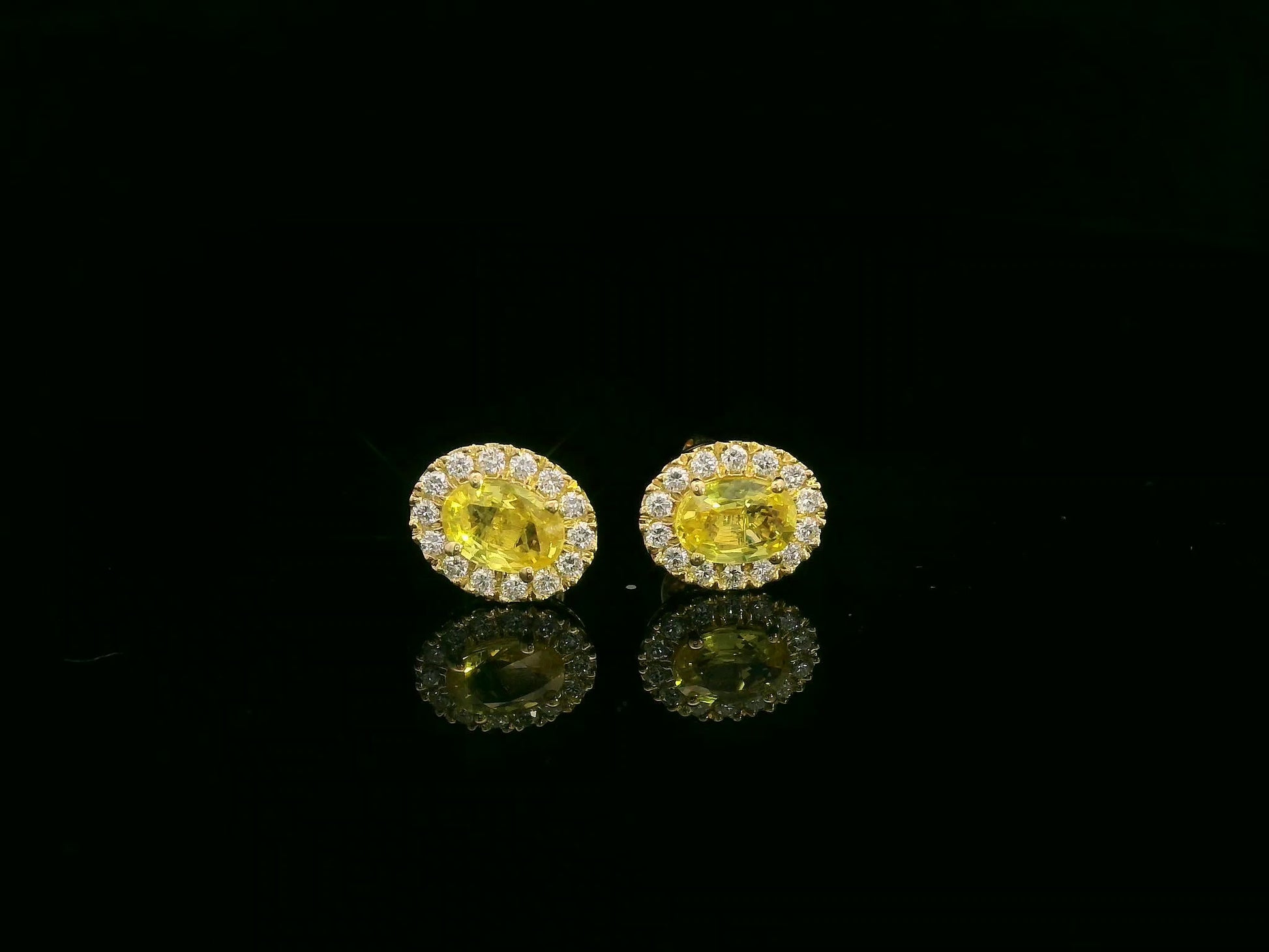 18K yellow gold yellow sapphire and diamond halo stud earrings by Emirates Diamonds