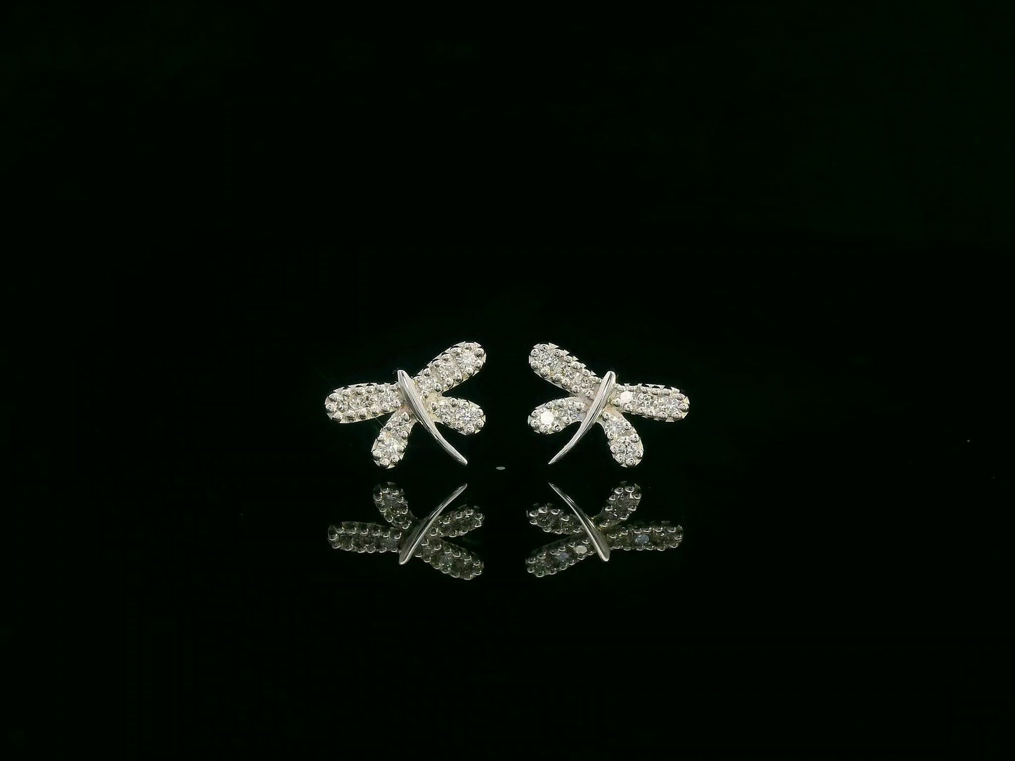 18K white gold diamond dragonfly stud earrings with pavé-set round brilliant diamonds by Emirates Diamonds
