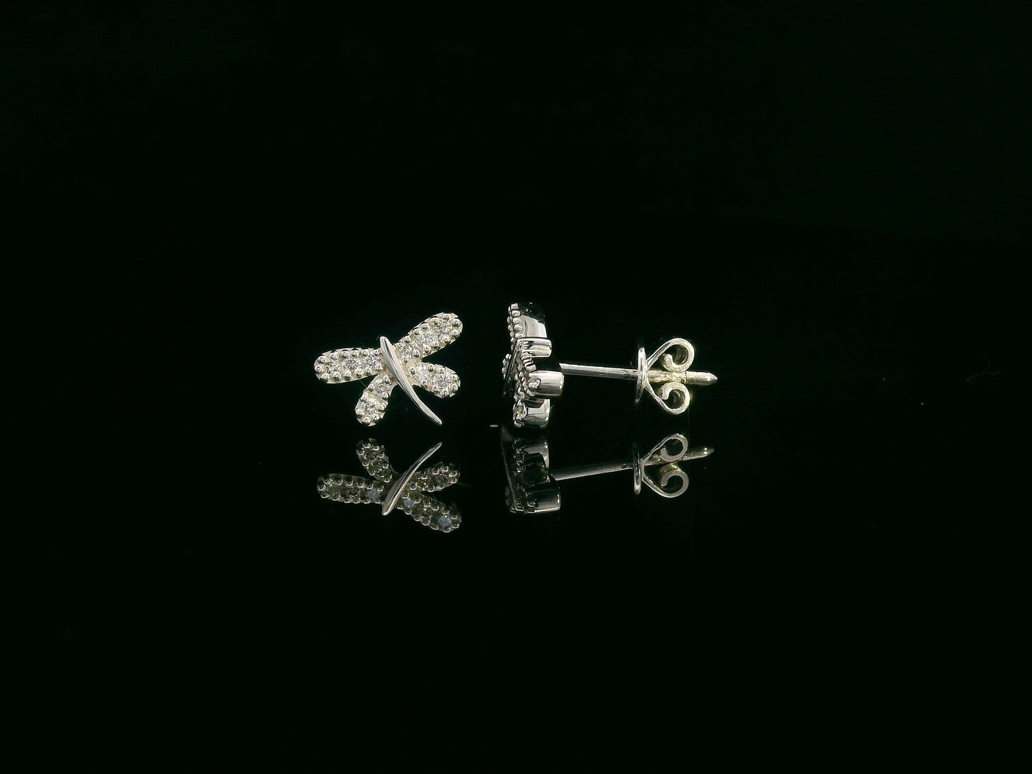 18K white gold diamond dragonfly stud earrings with pavé-set round brilliant diamonds by Emirates Diamonds