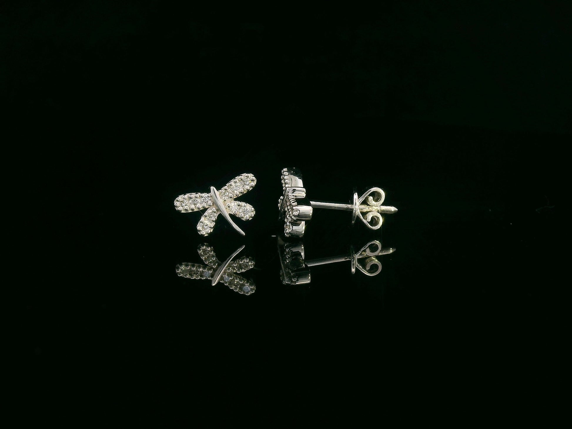 18K white gold diamond dragonfly stud earrings with pavé-set round brilliant diamonds by Emirates Diamonds
