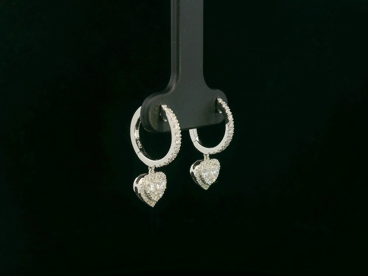 18K white gold diamond heart drop hoop earrings with pavé-set diamonds, luxury fine jewelry by Emirates Diamonds.