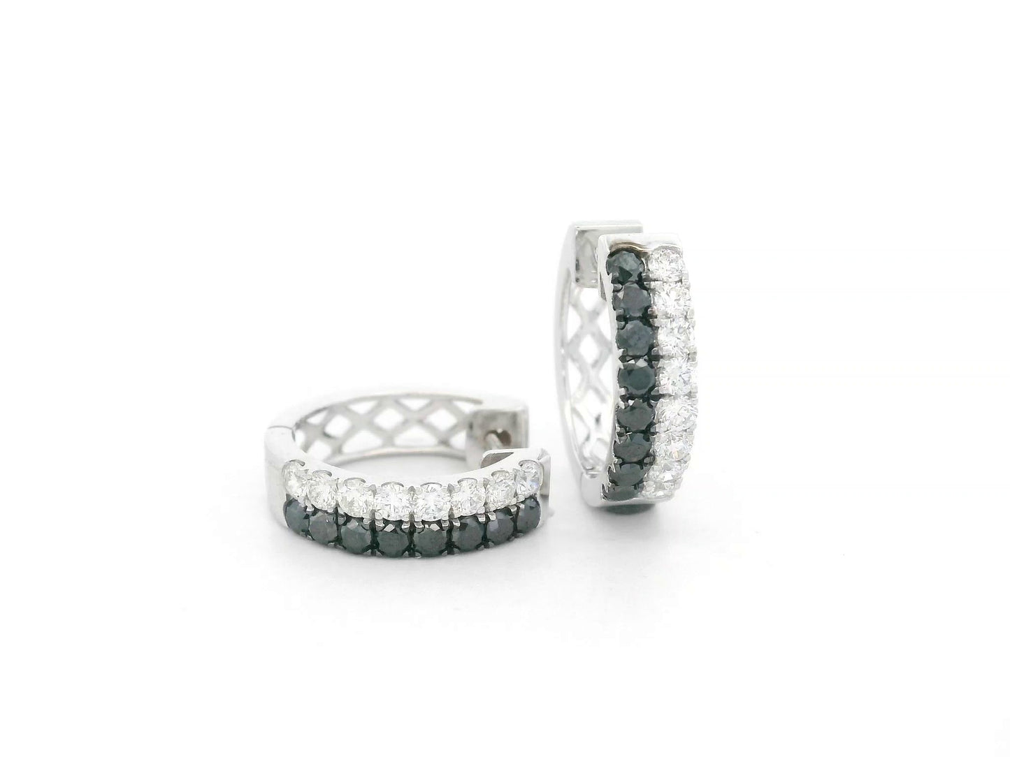 18K white gold hoop earrings with white and black pavé-set diamonds, modern luxury design by Emirates Diamonds.