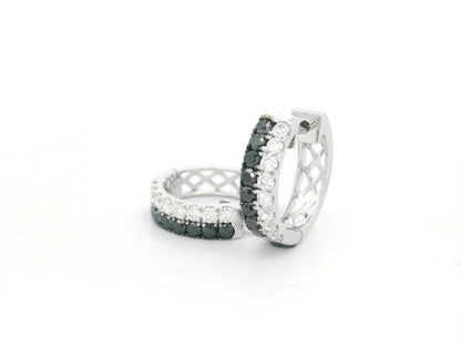 18K white gold hoop earrings with white and black pavé-set diamonds, modern luxury design by Emirates Diamonds.